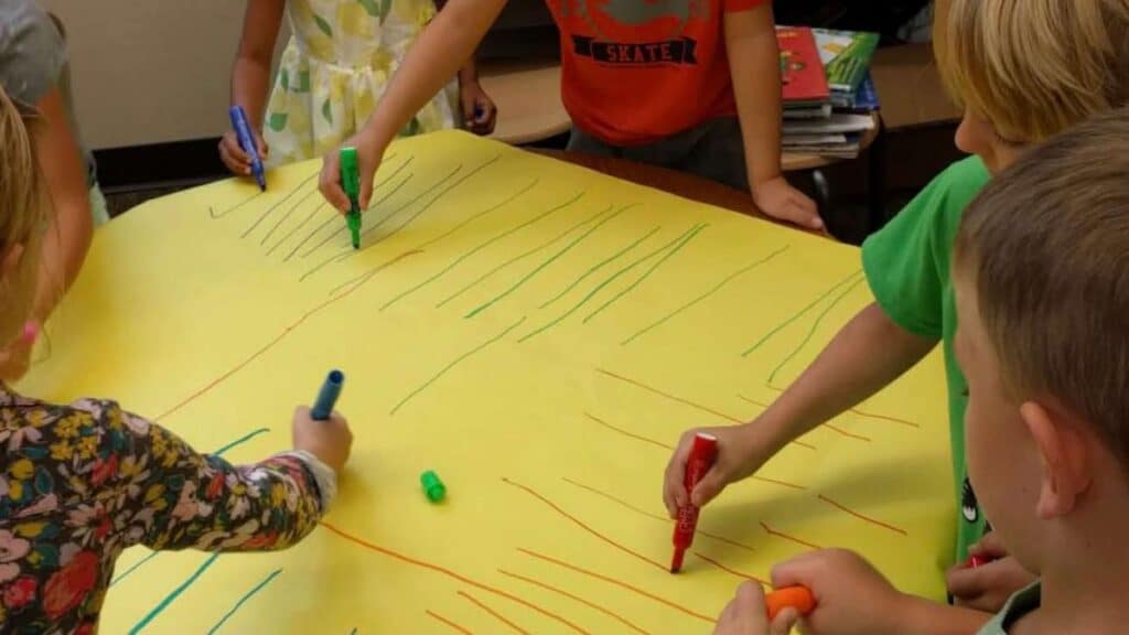 Handwriting for early learners—large pre-writing strokes on paper.