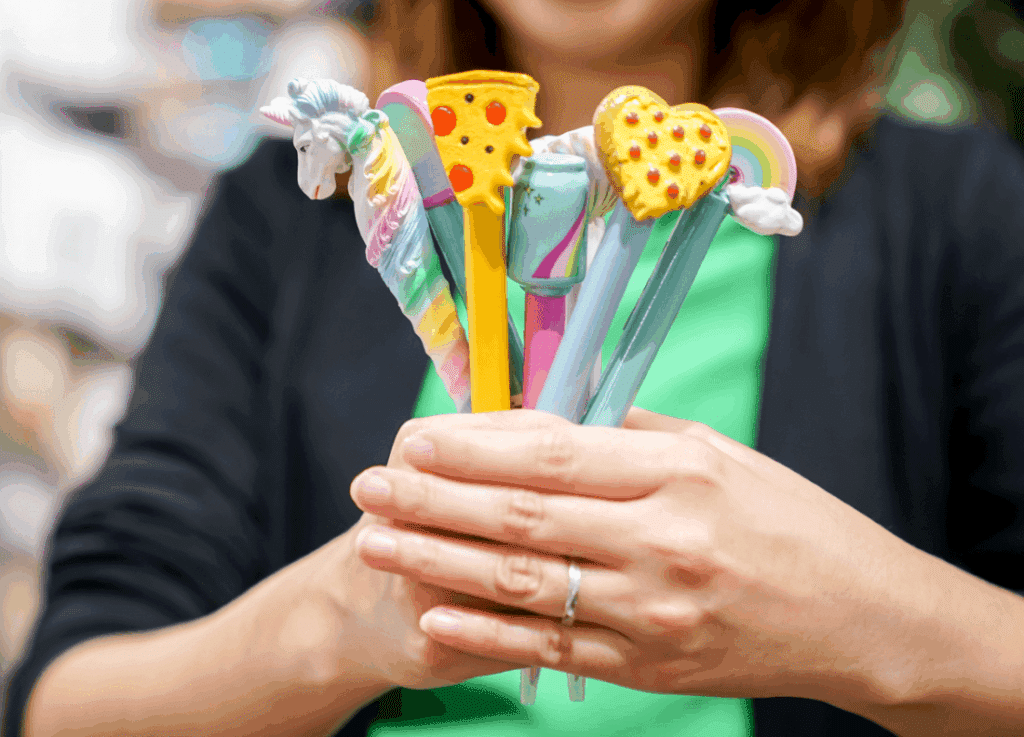 Track print with novelty pens.